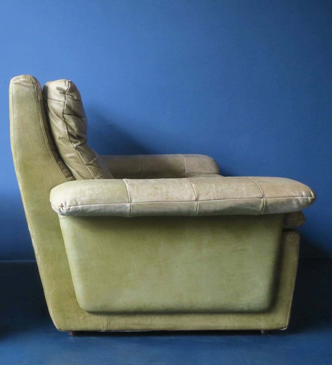 Patchwork leather olive green lounge chair and ottoman by Laauser, 1970s