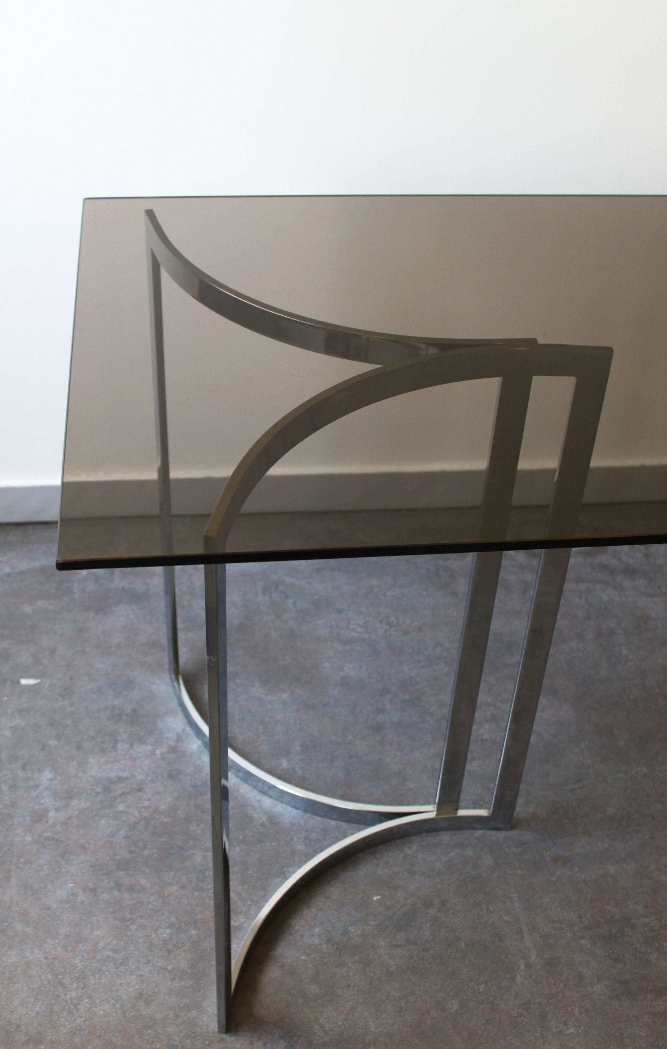 Smoked glass console with chrome legs, 1970.