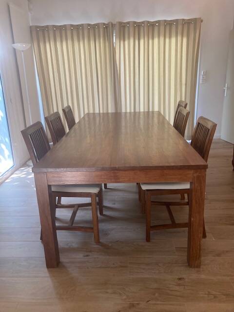 Teak dining table and its 6 chairs.