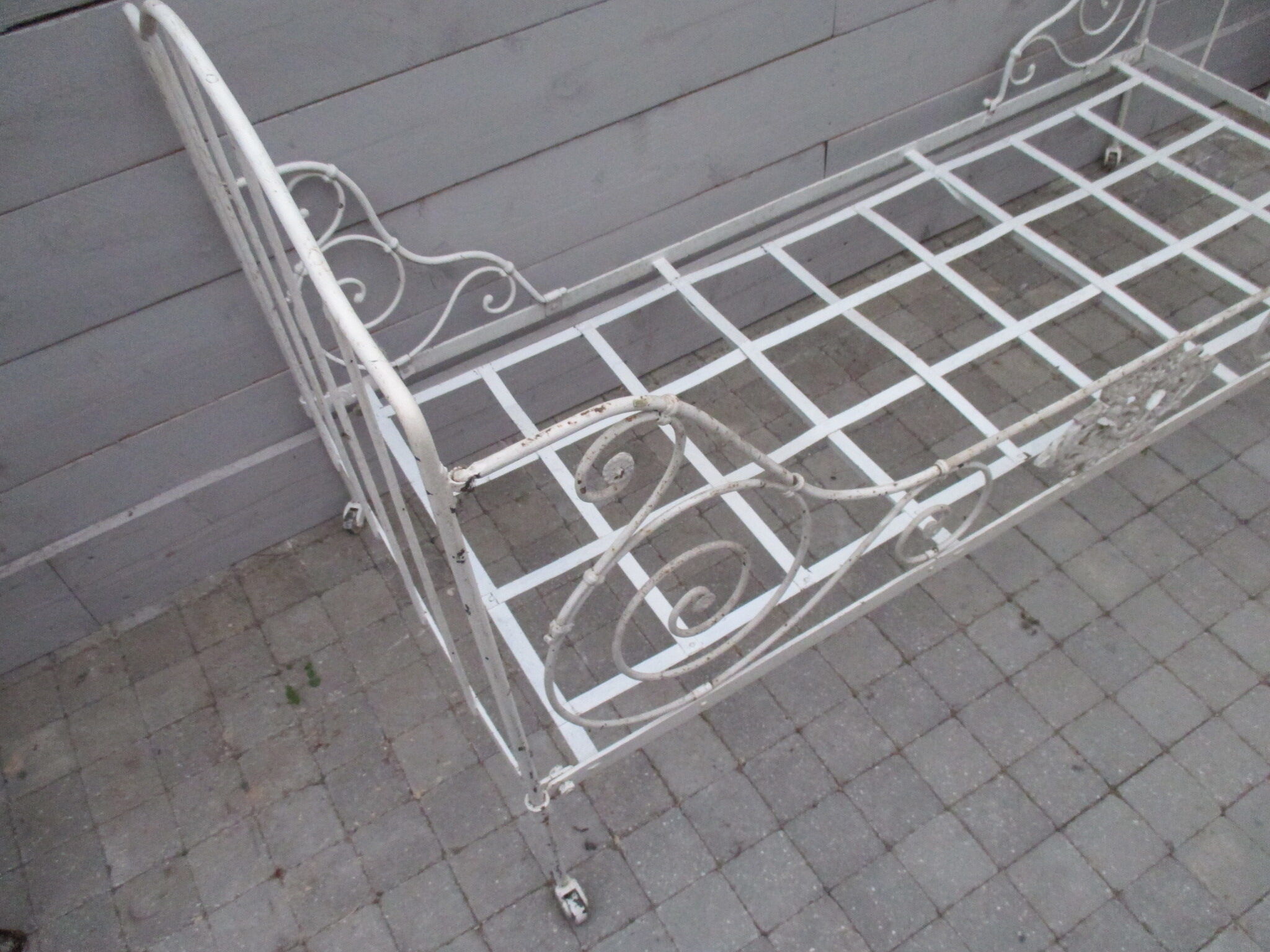 Folding wrought iron bed