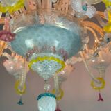 Venetian chandelier in multicolored Murano glass predominantly milky white, 12 arms of light