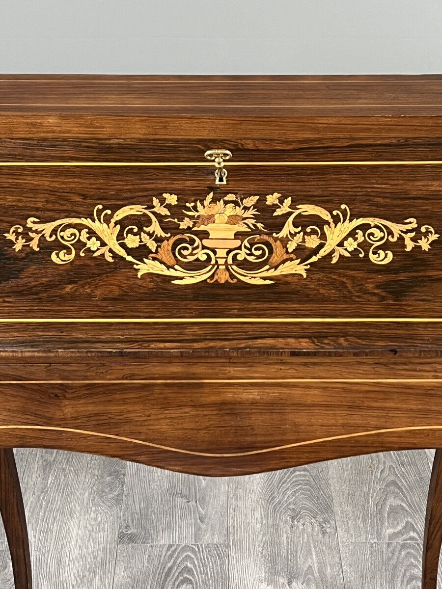 Secretary with a drop-down front in marquetry, Louis XV style, 19th century.