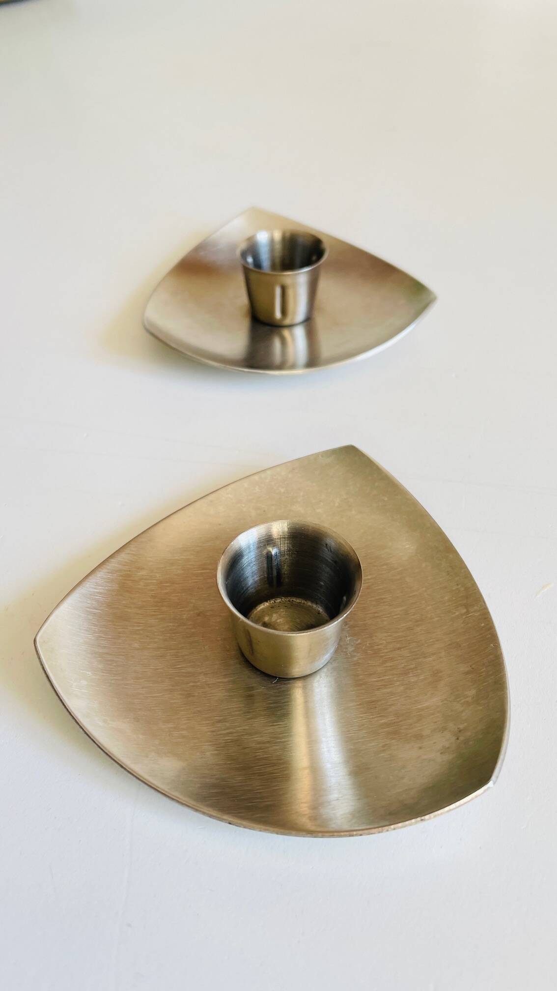 Vintage brushed metal geometric candle holders