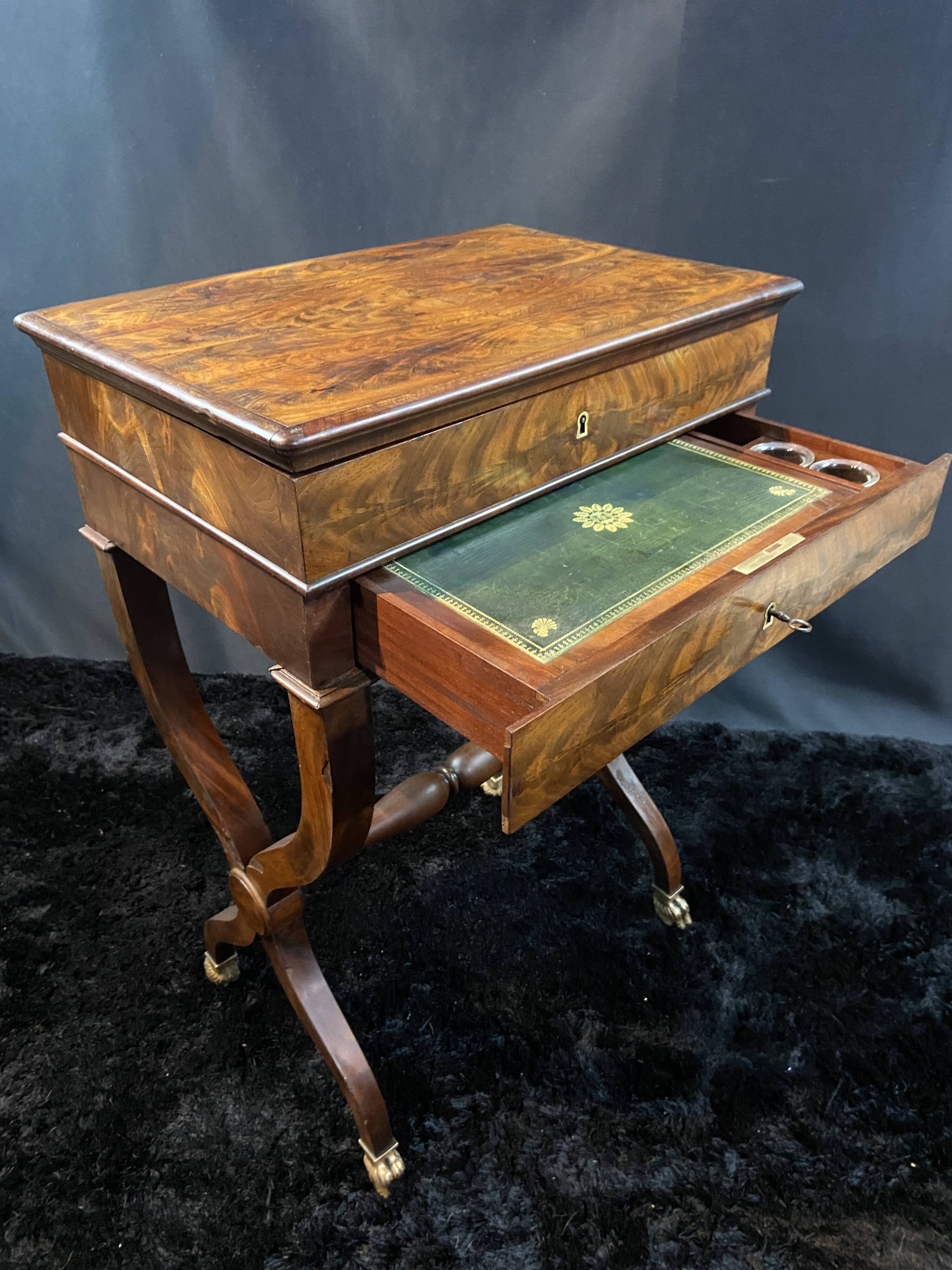 Louis-Philippe period mahogany writing desk with candlestick, 19th century