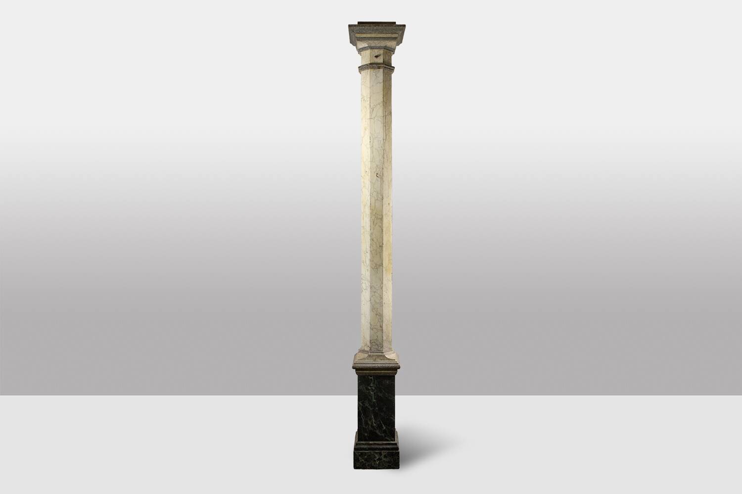 Pair of wooden columns painted to imitate marble. 1880s.
