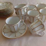 Set of 8 pairs of cups and saucers in Paris porcelain