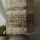 Vintage ceramic lamp with a wool shade.