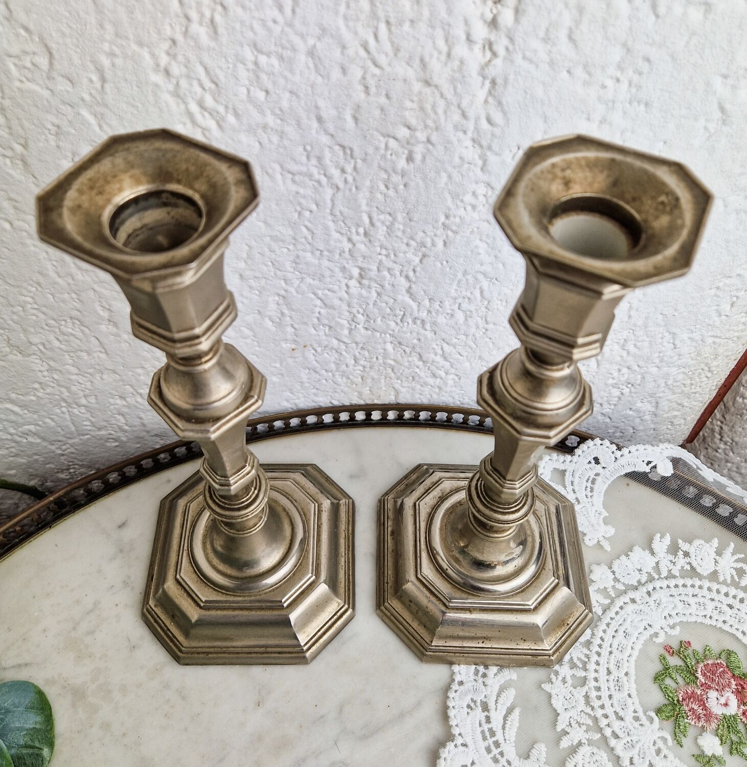 Pair of neo classical style candle holders in silver metal