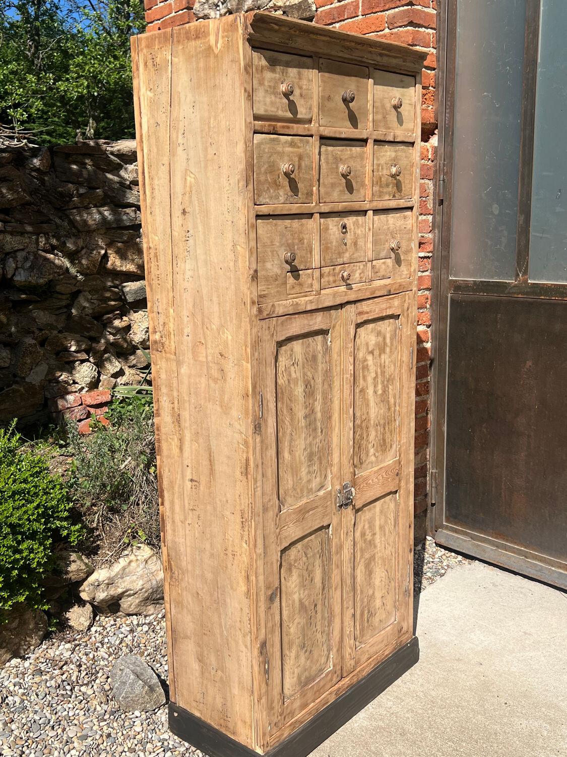 Beautiful piece of furniture with 8 drawers/2 doors in raw wood.