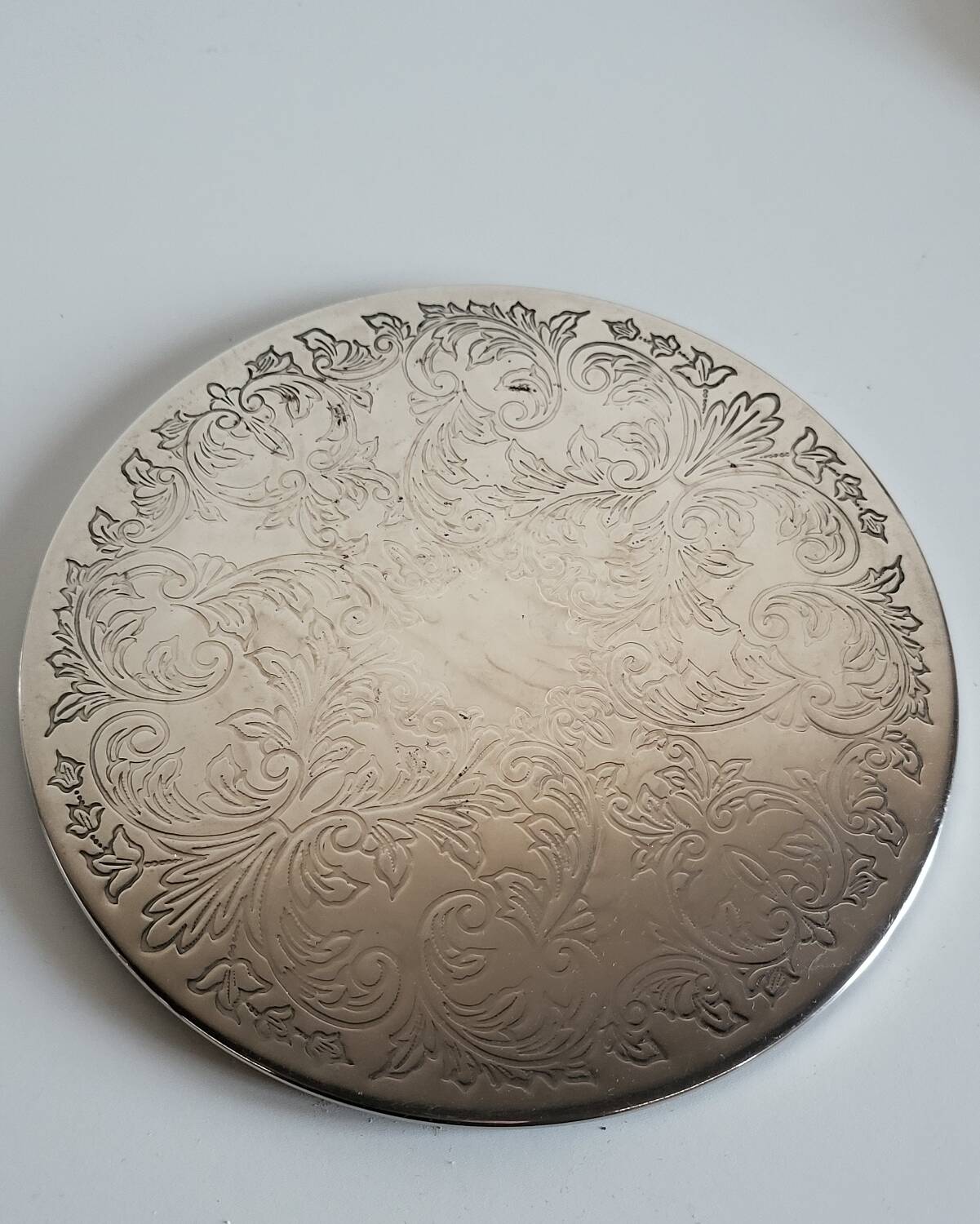 Silver-plated metal trivet English