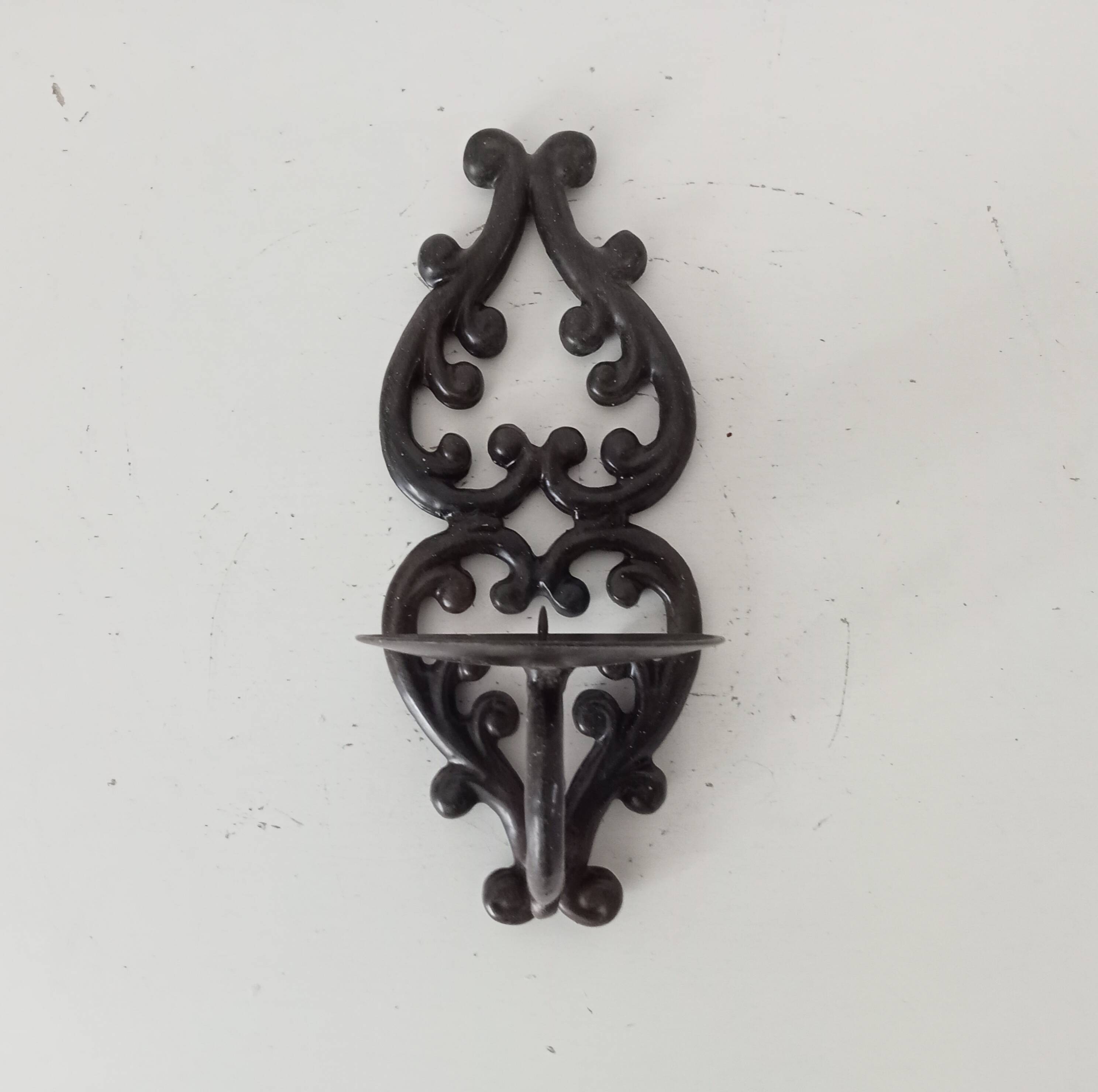 Antique wall candle holder in enamelled cast iron