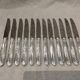 12 silver-plated metal table knives by the silversmith Ravinet Denfert, Empire style, model 81.