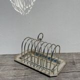 Flat silver metal tray with duck and toast