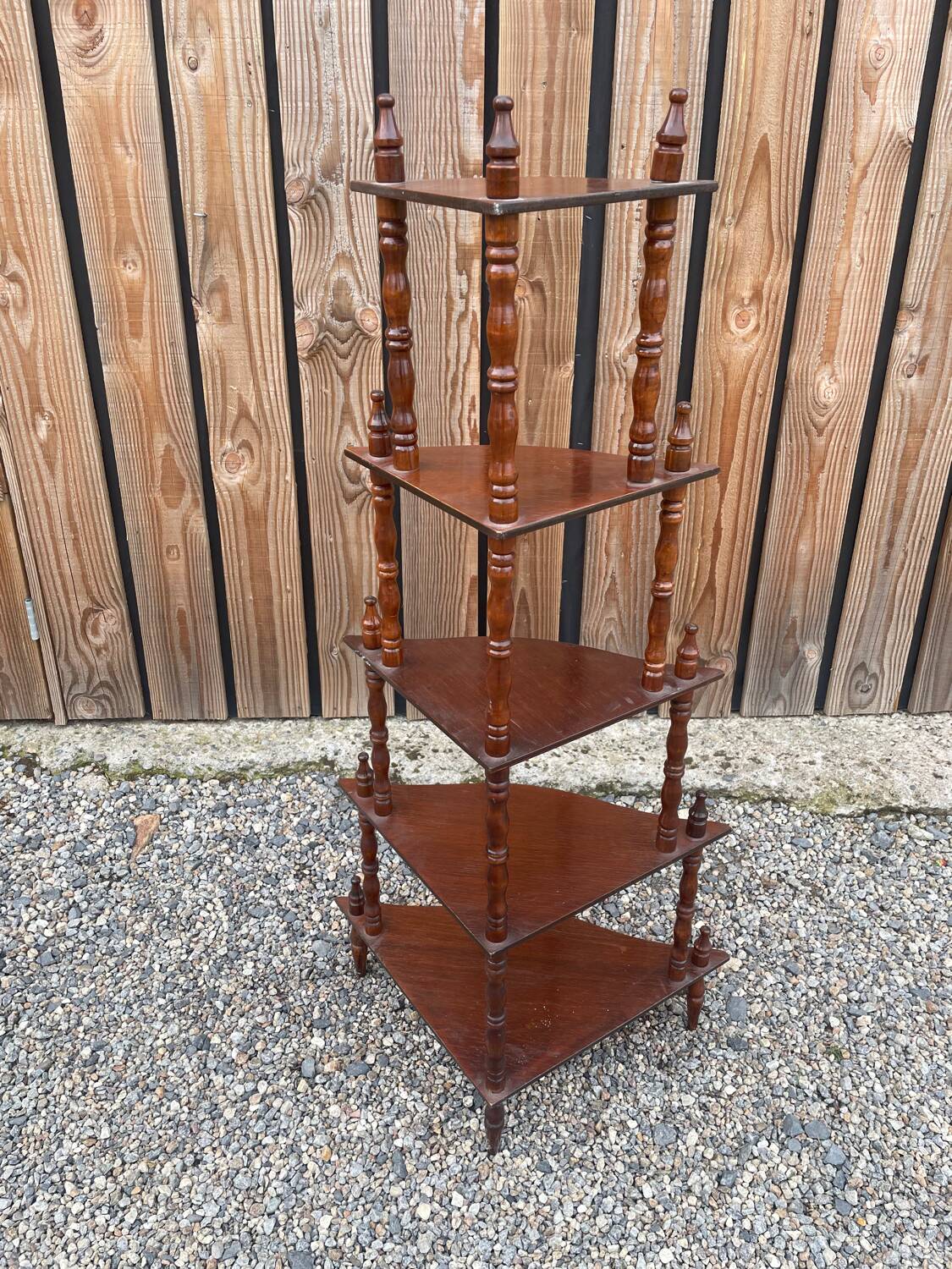 Wooden corner shelf on legs with 5 shelves