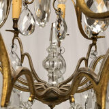 Gilded brass cage chandelier and glass tassels