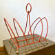 Vintage orange metal magazine rack, 1970s