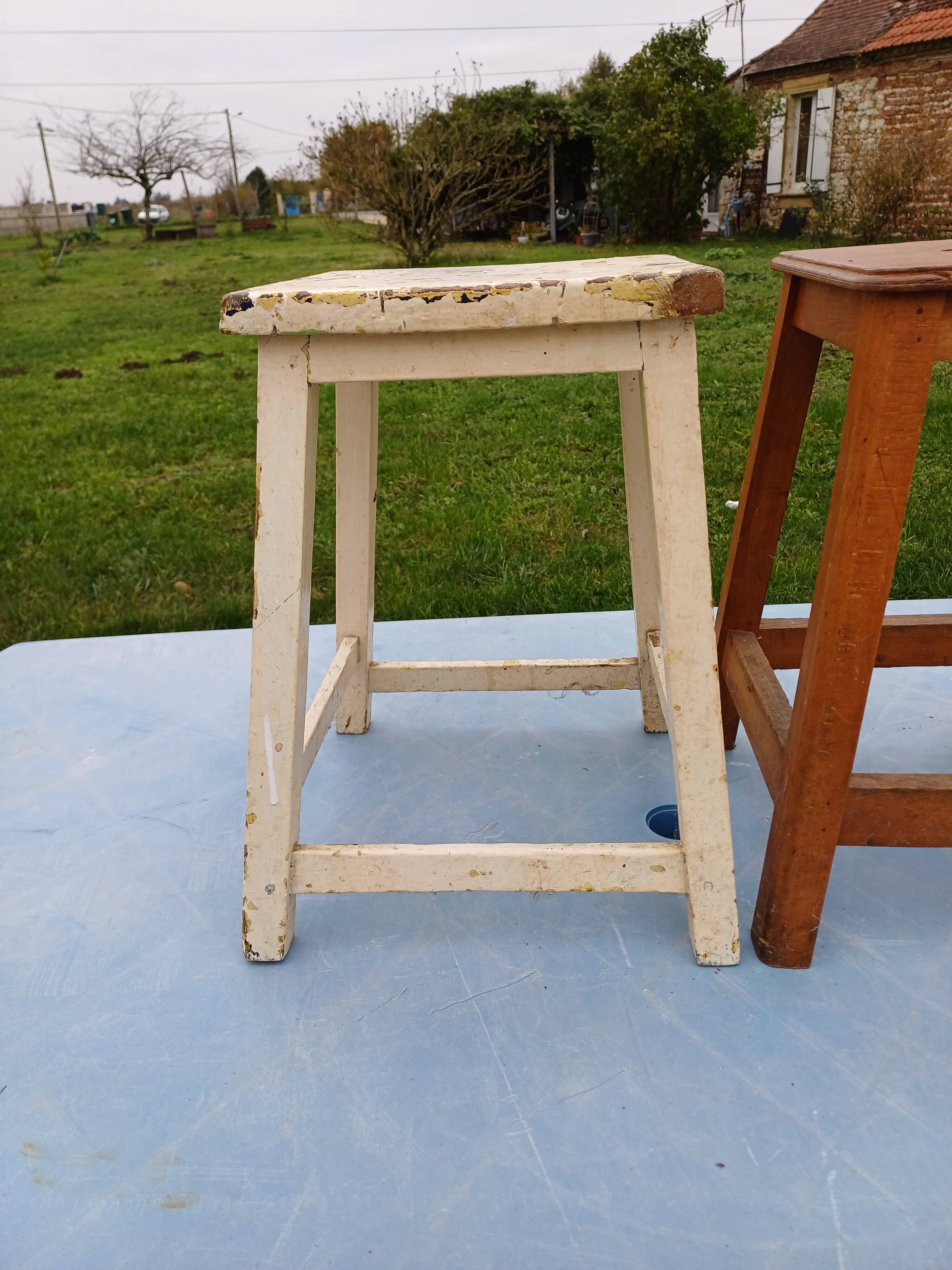 2 wooden workshop stools