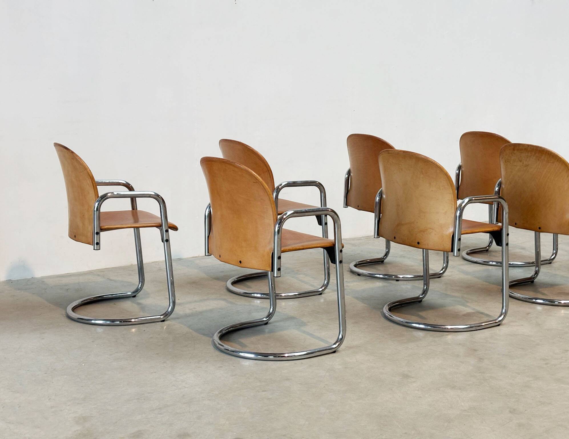 Set of eight cognac leather Dialogo Dessau dining chairs by Afra E Tobia Scarpa