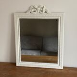 Late 19th century mirror with decorated pediment. 80x62.