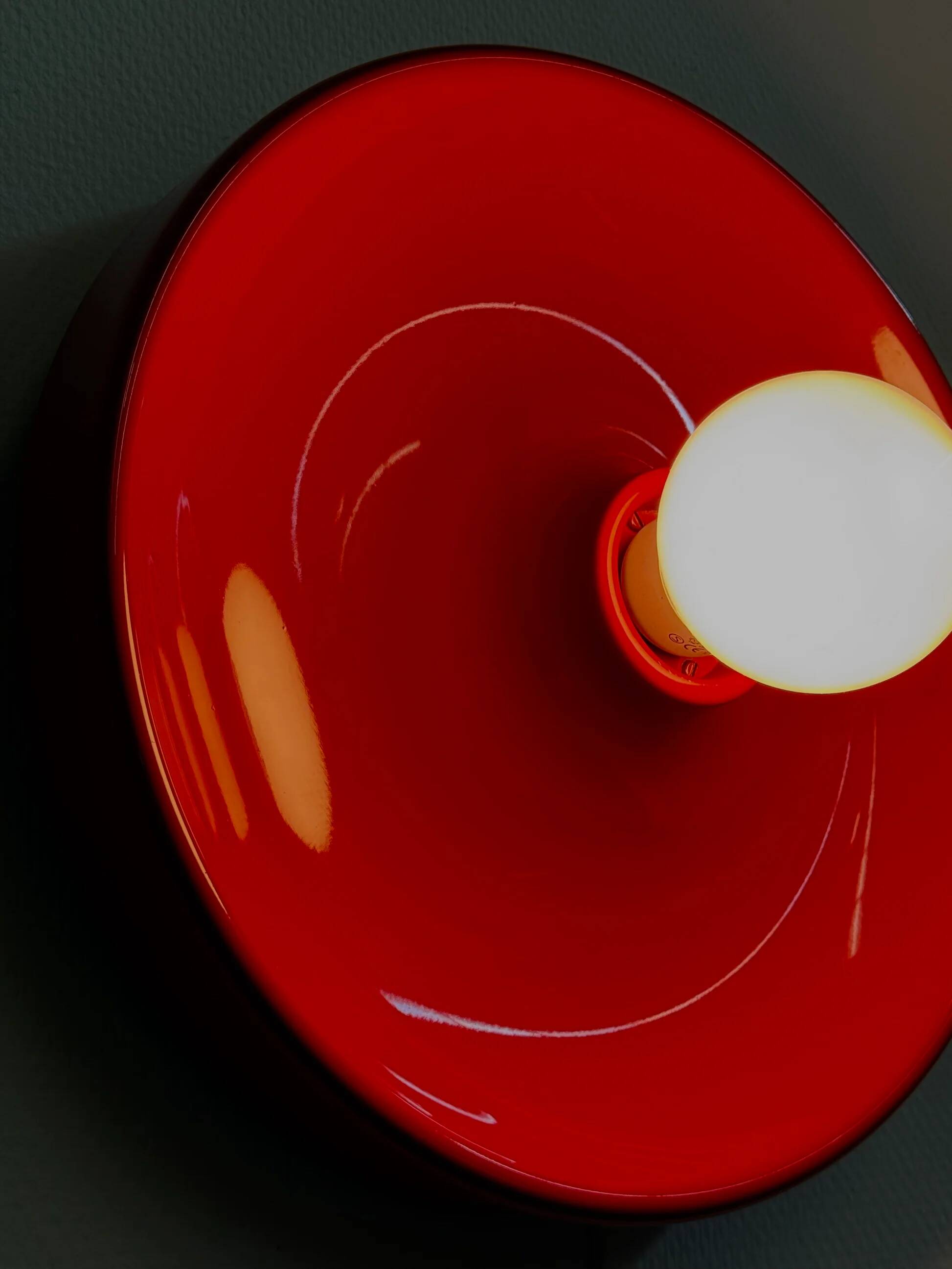 Red space age disc lamp by Enrico Tronconi