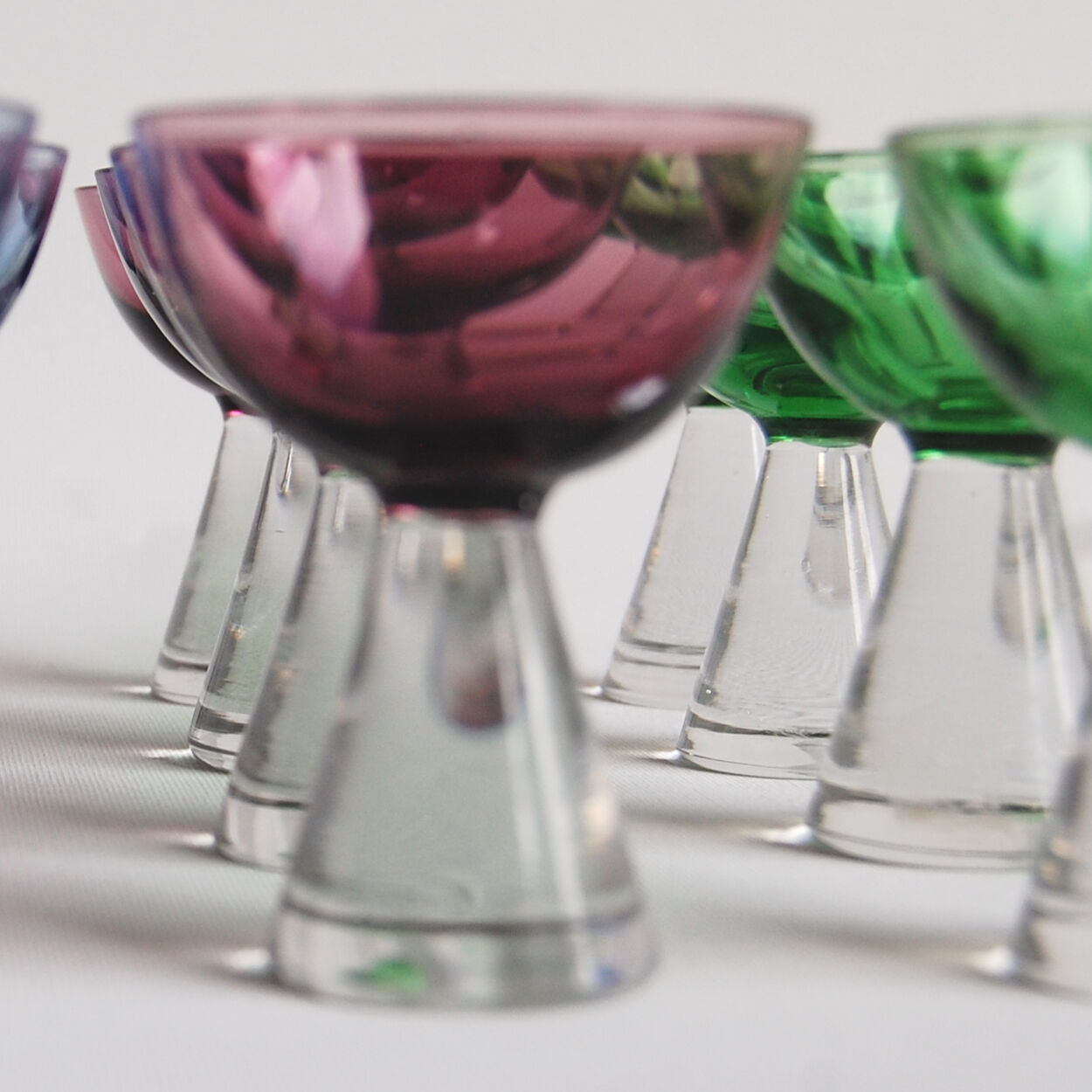 Set of 12 alcohol glasses in colored glass 1950s