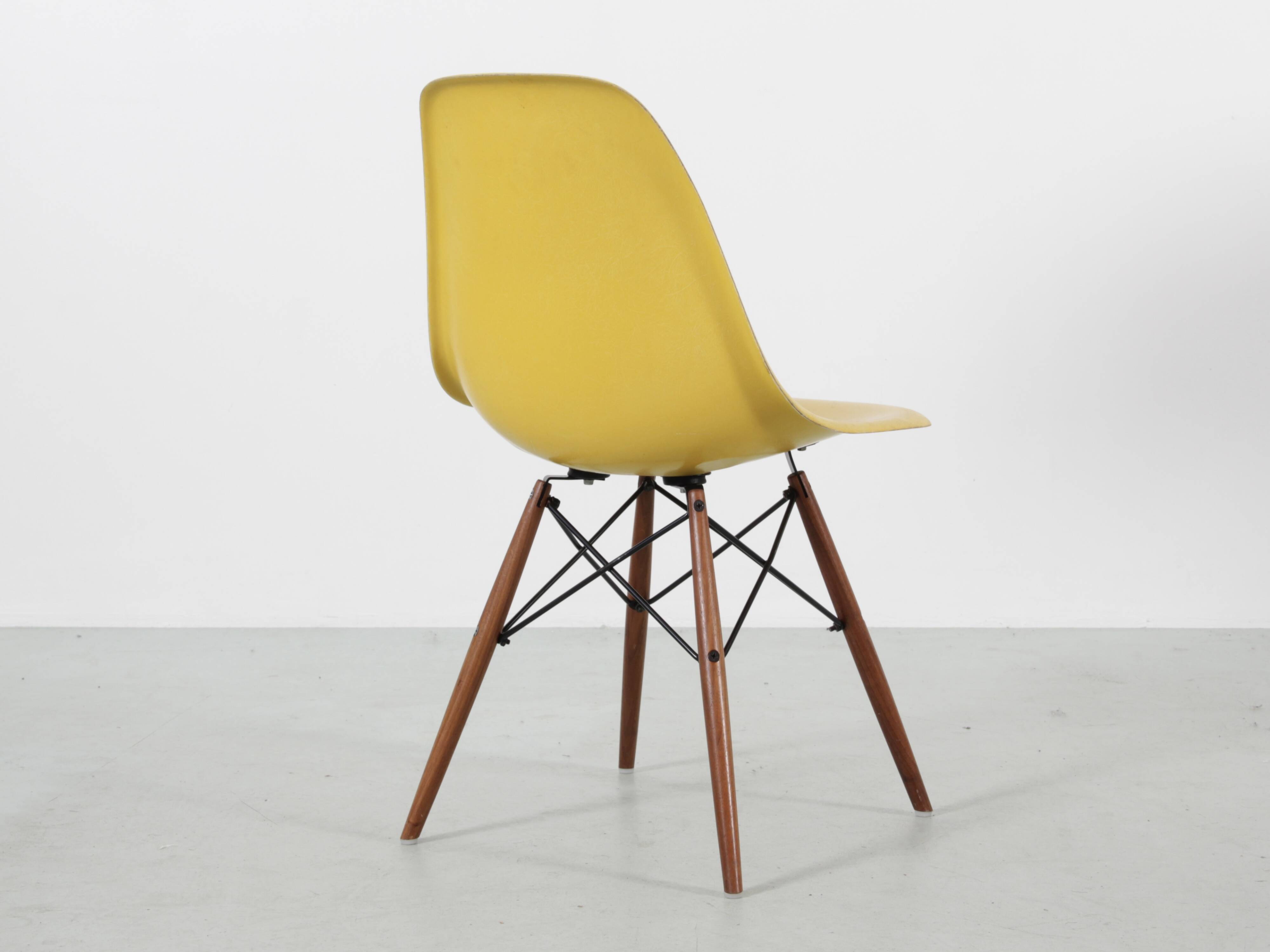 Set of 4 DSW chairs by Charles Eames - yellow fibreglass edition by Herman.