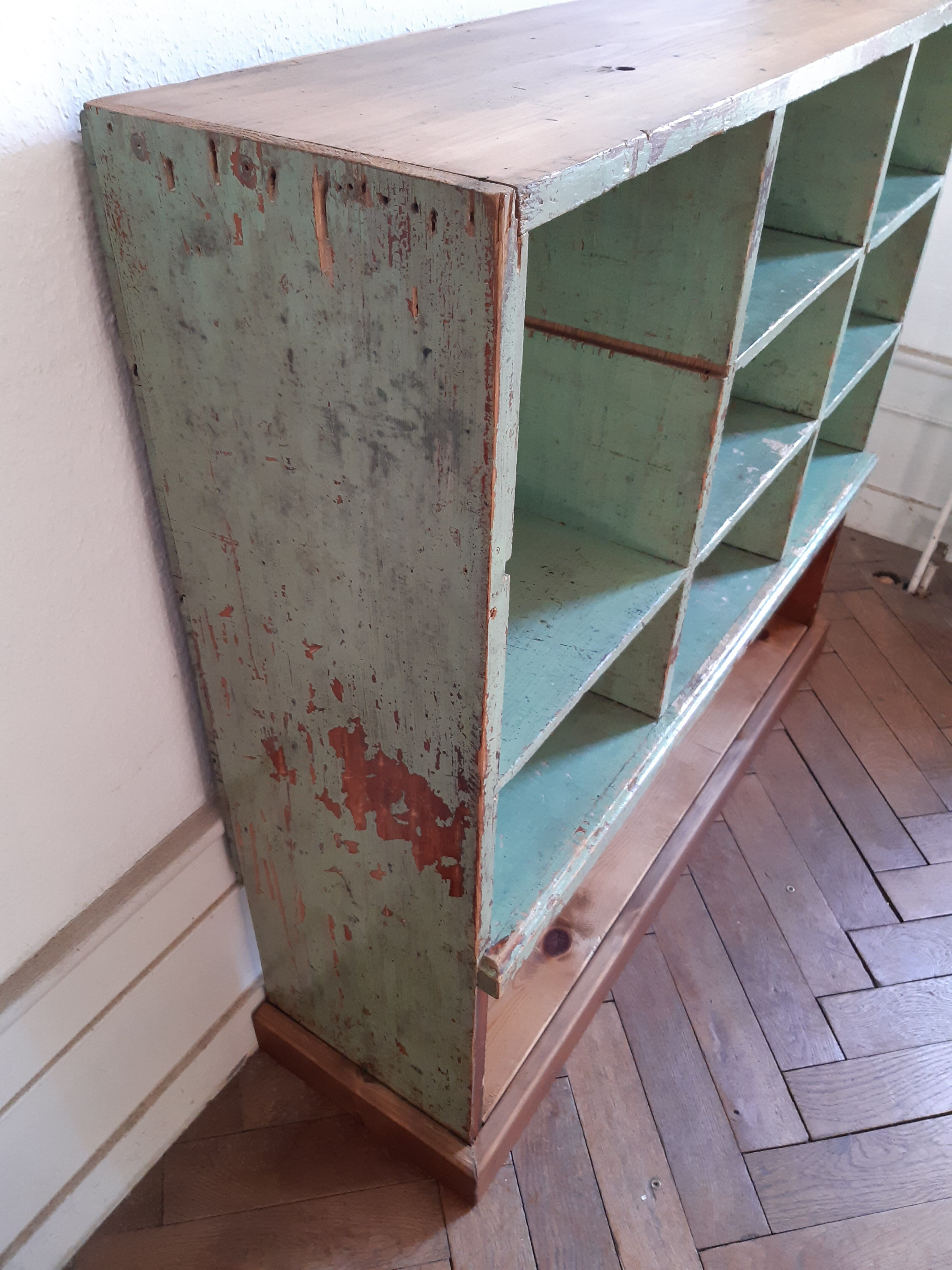 Old library shelf in patinated grocery tree