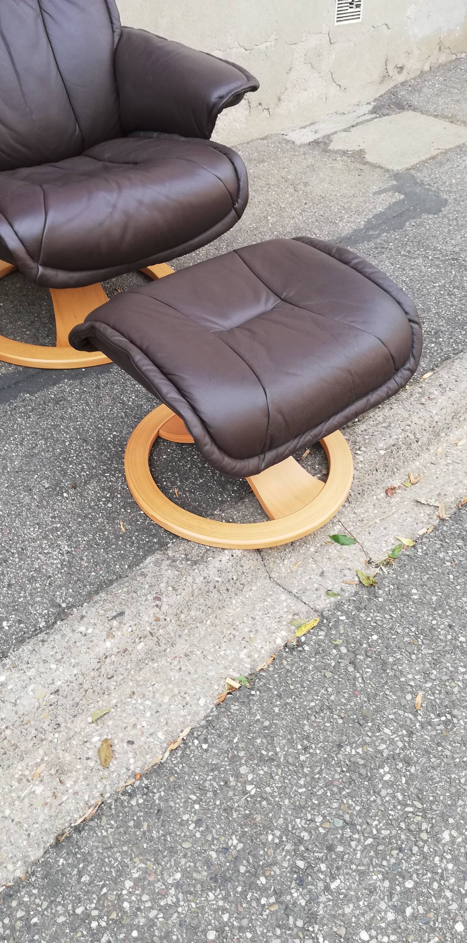 Pair of vintage armchairs with ottoman