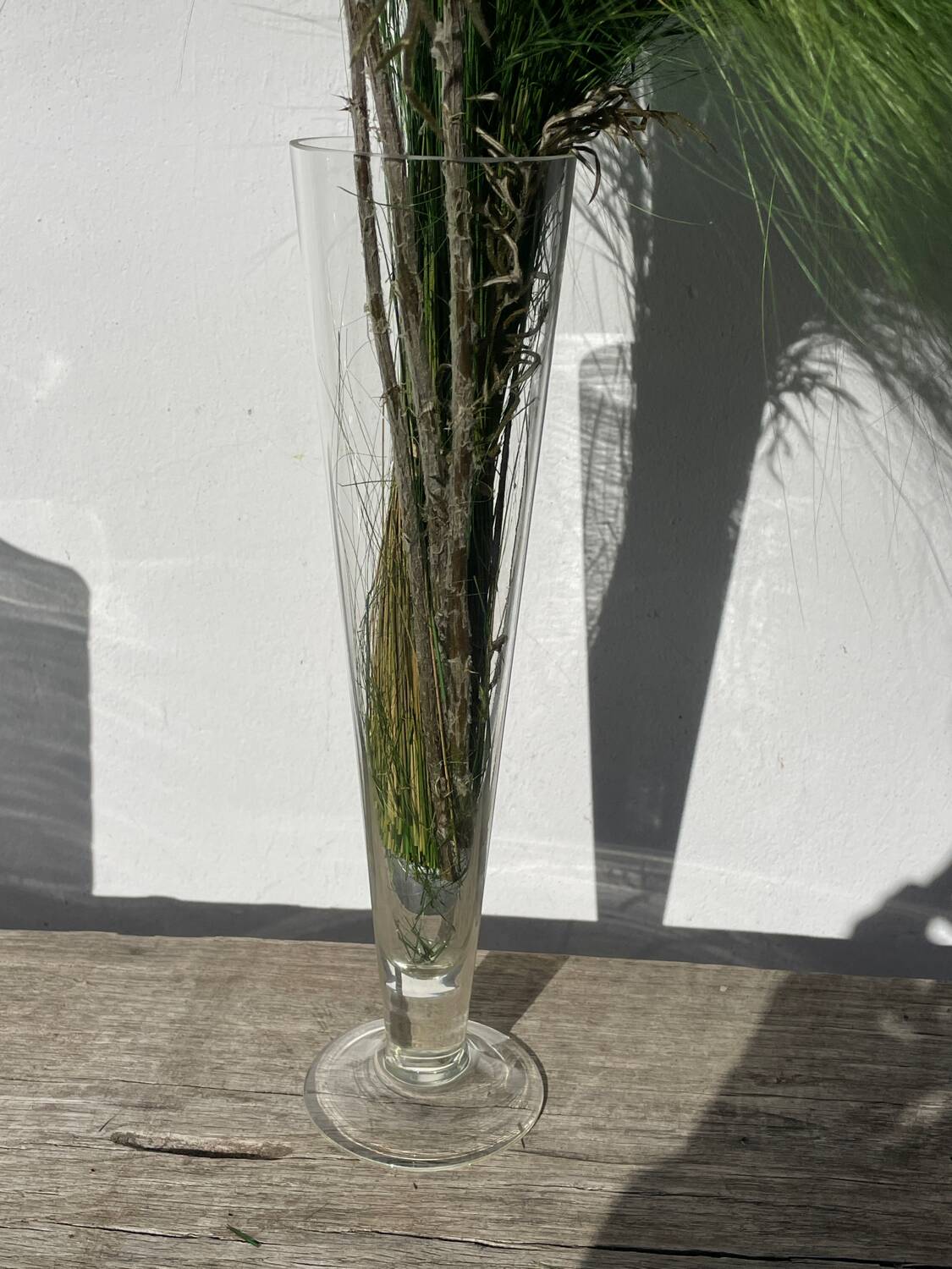 Large conical vase in clear designer glass.