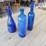 3 blue bottles