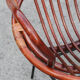 Rattan shell armchair with metal feet