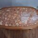 Coffee table with a stone top.