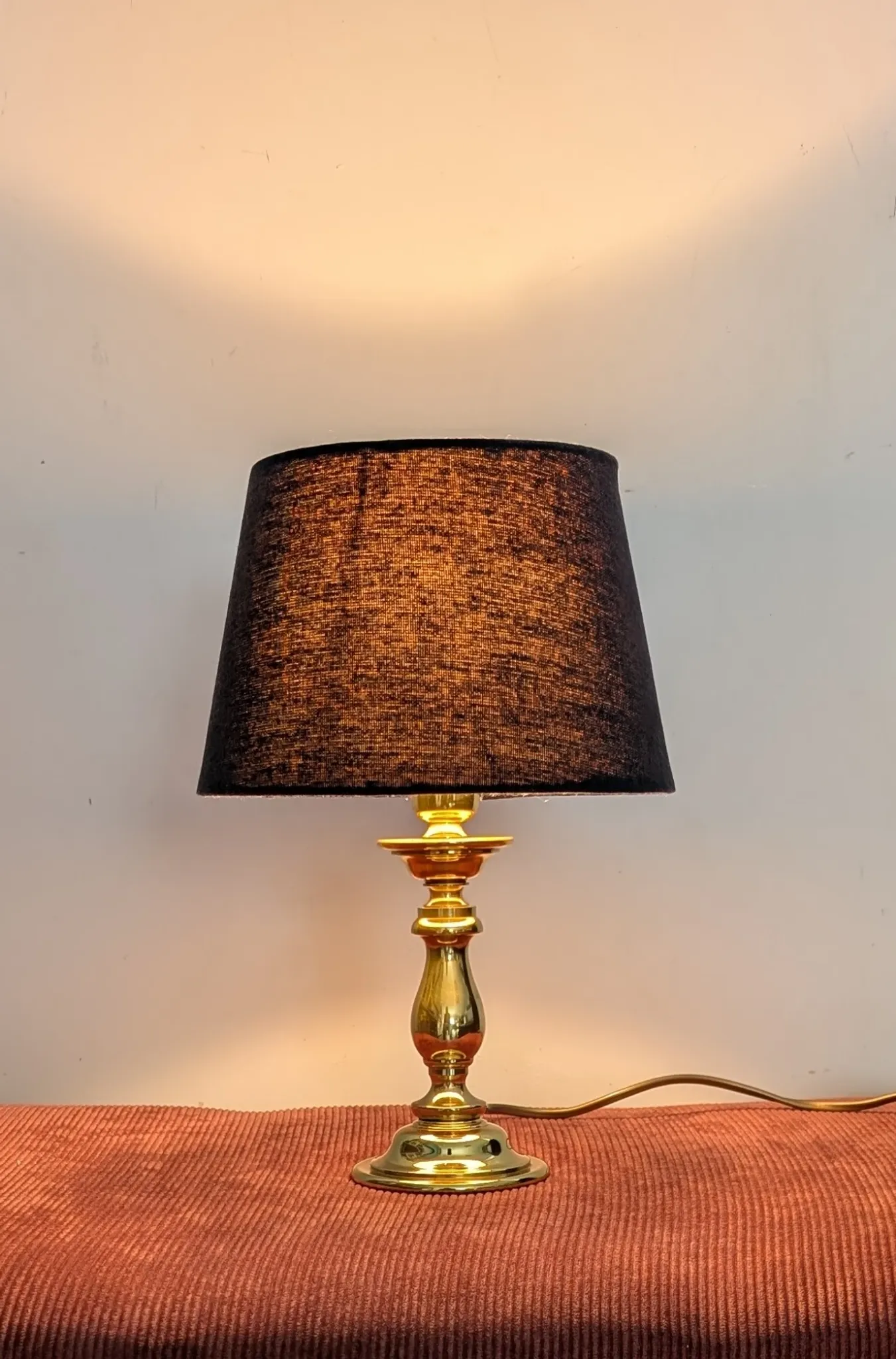 Brass lamp with black fabric shade