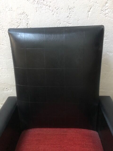 Vintage armchair in red and black skaï