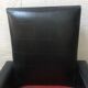 Vintage armchair in red and black skaï