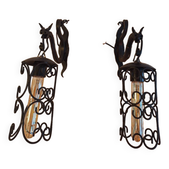 pair of wrought iron animal wall lights