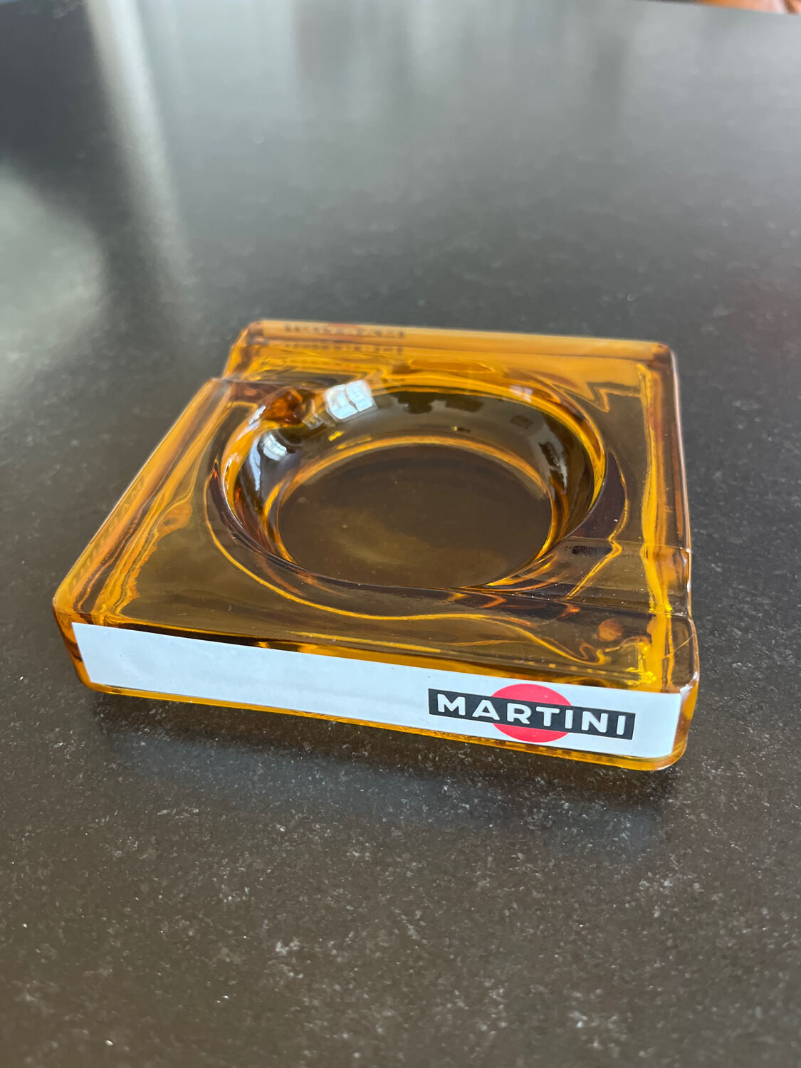 Advertising ashtray martini