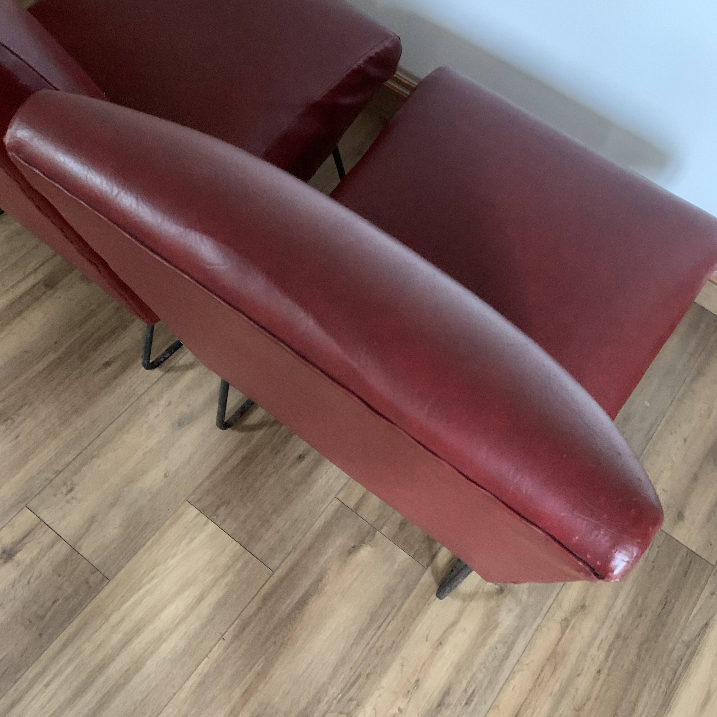 Pair of vintage burgundy red armchairs