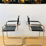 Pair of tubular armchairs in metal and leather Style Marcel Breuer