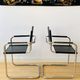 Pair of tubular armchairs in metal and leather Style Marcel Breuer