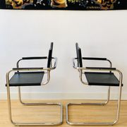 Pair of tubular armchairs in metal and leather Style Marcel Breuer