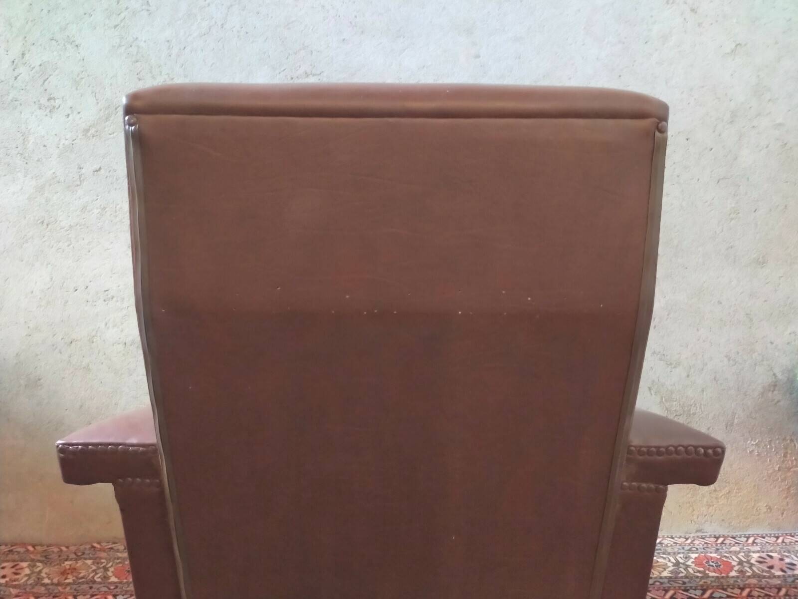 Vintage armchair in faux leather
