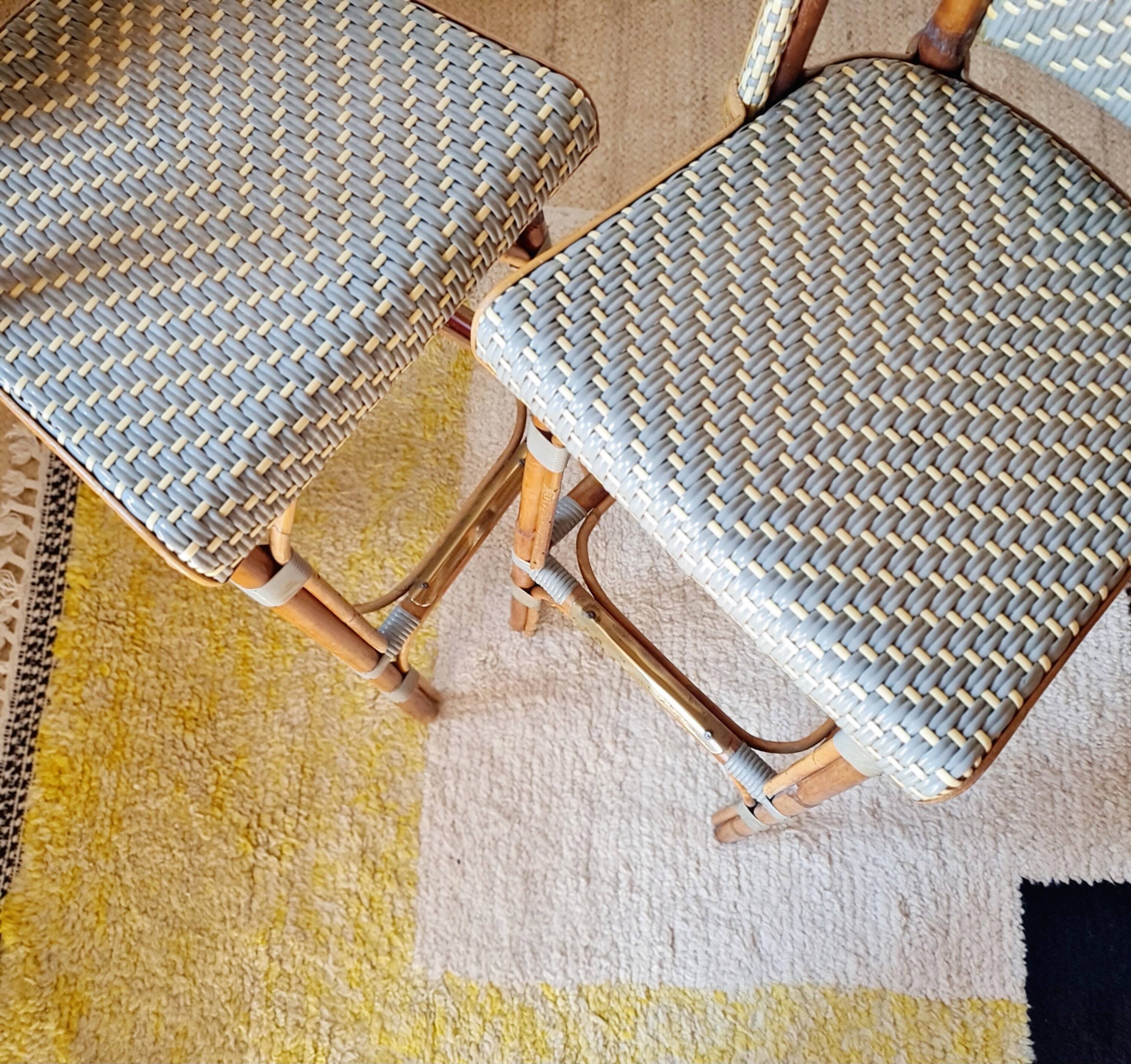 Vintage Gaty bar stools in two-tone rattan and caning.