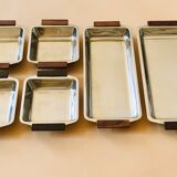 Service of Scandinavian dishes in stainless steel and teak 1970