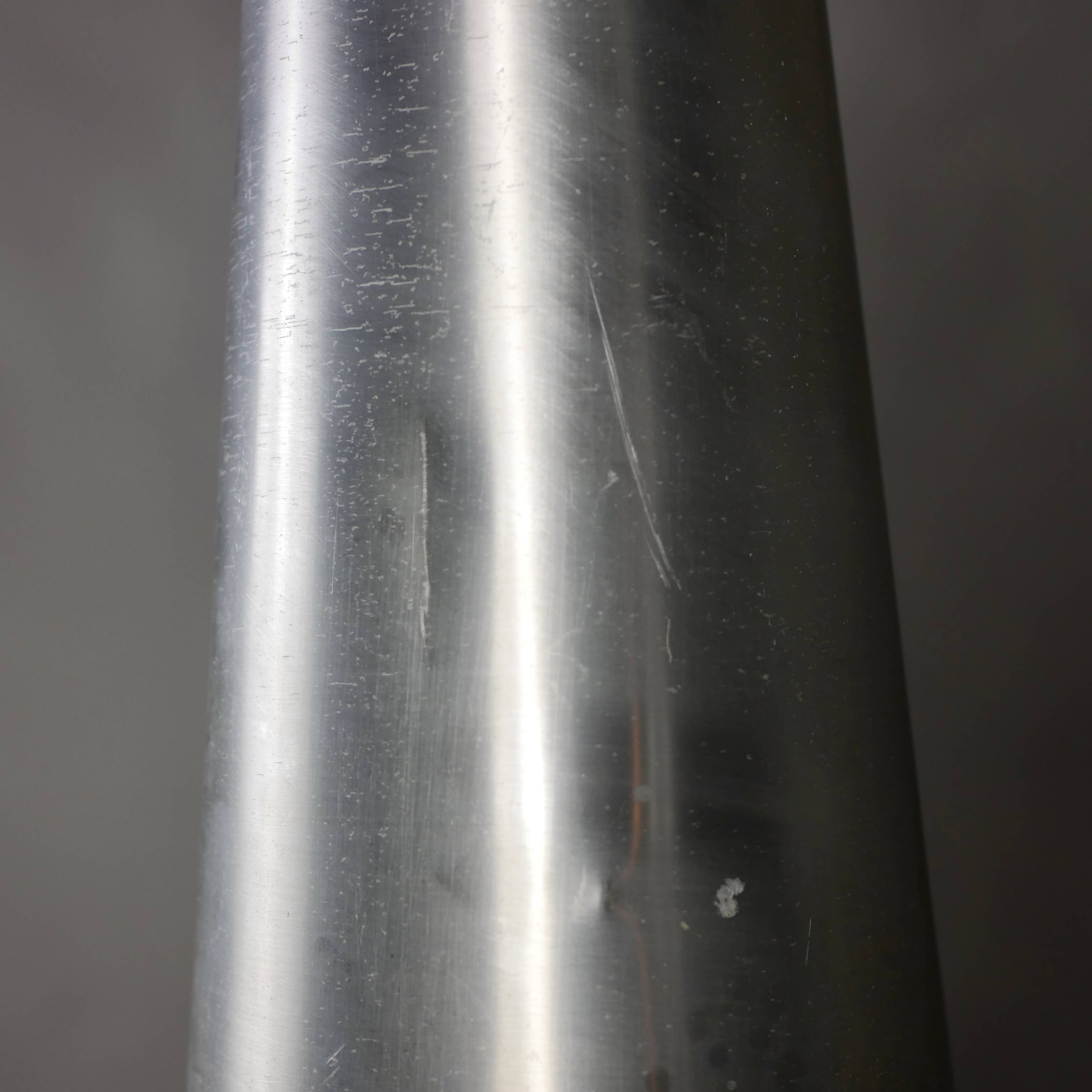 Trio of Raak steel pendant lights, 1960s