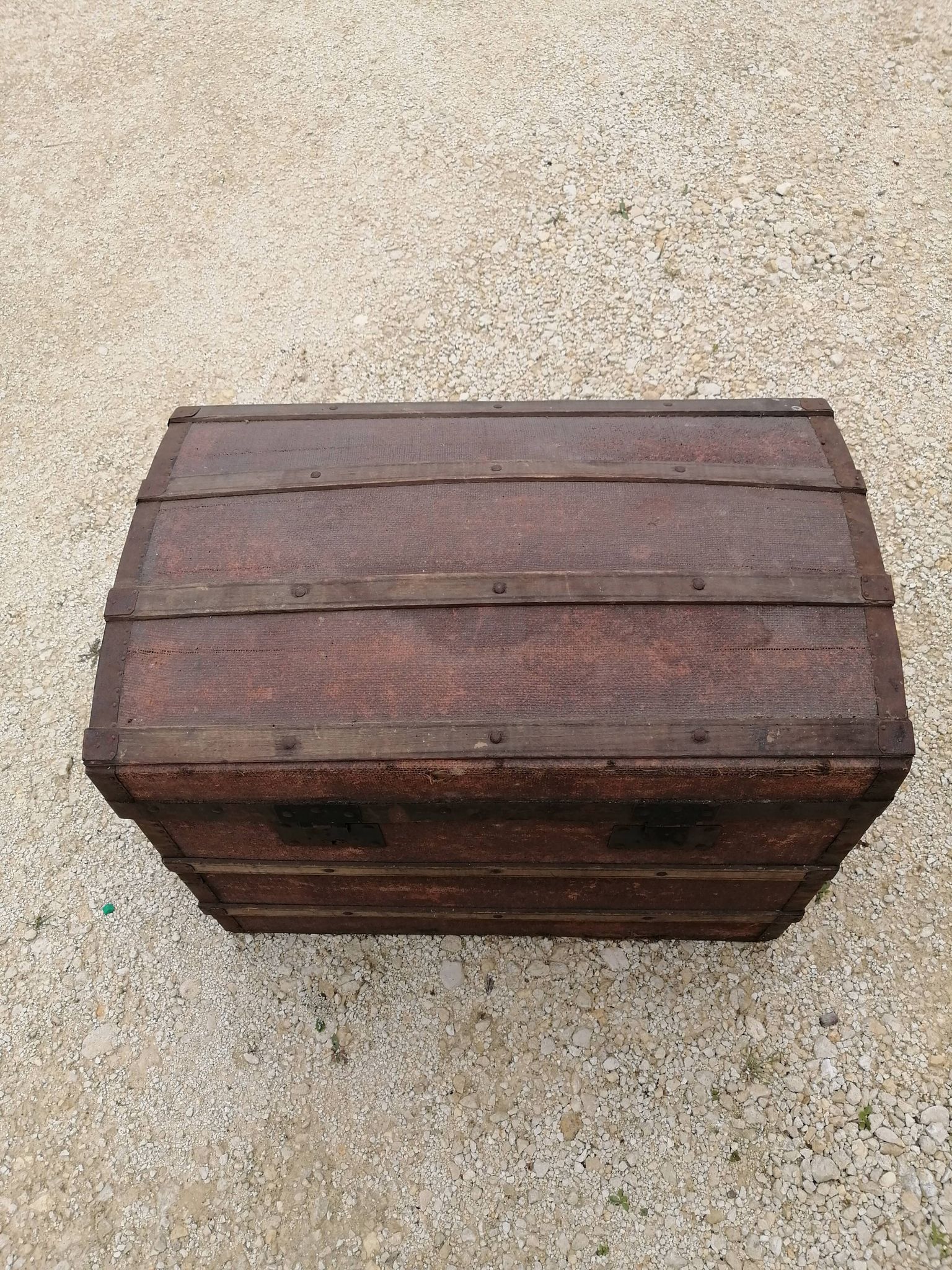 Old bombed travel trunk