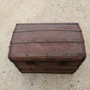 Old bombed travel trunk