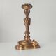 Antique 19th-century solid gilded bronze candlestick in the Louis XV style.