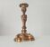 Antique 19th-century solid gilded bronze candlestick in the Louis XV style.