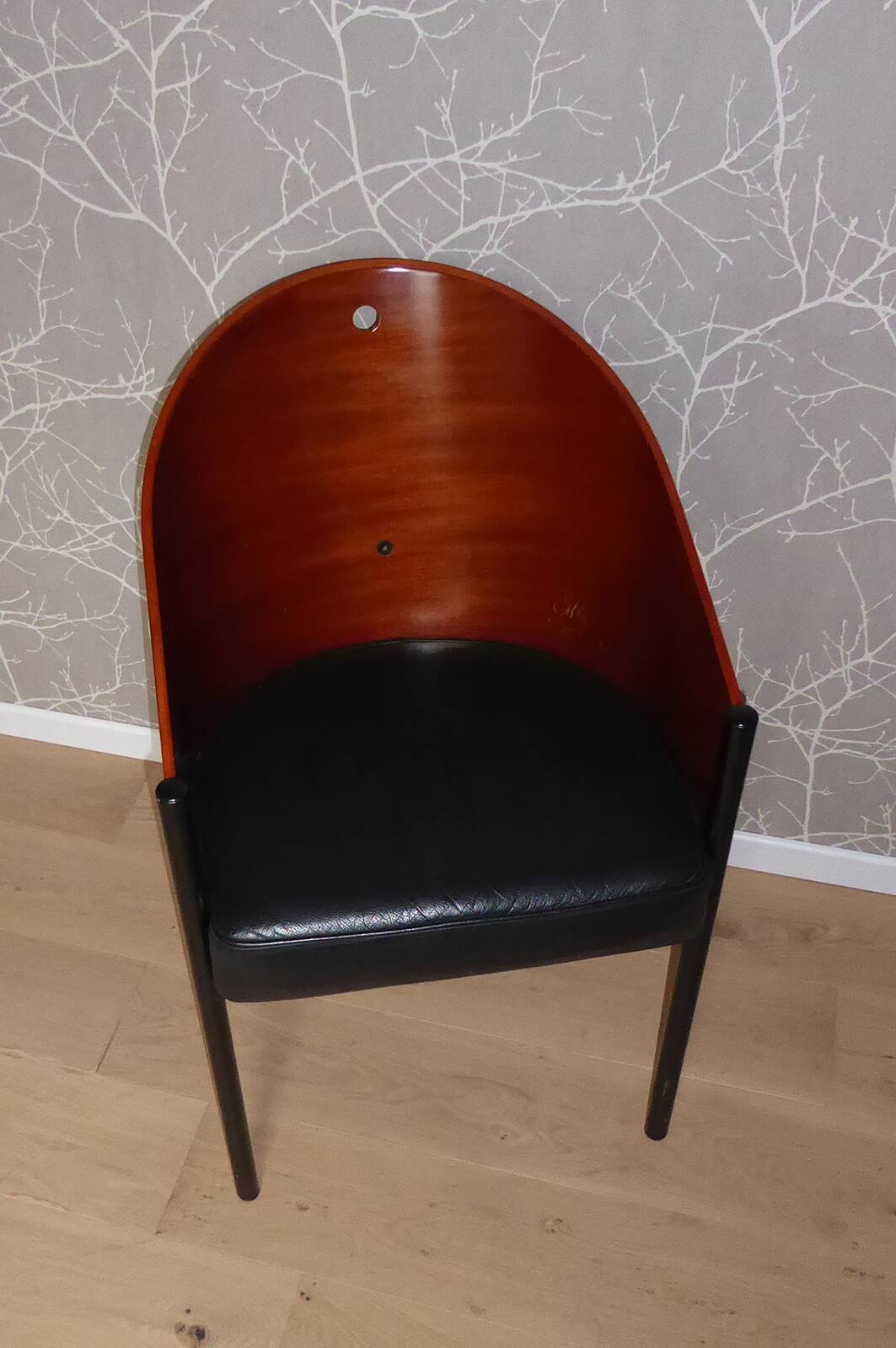 Coste mahogany and black armchair